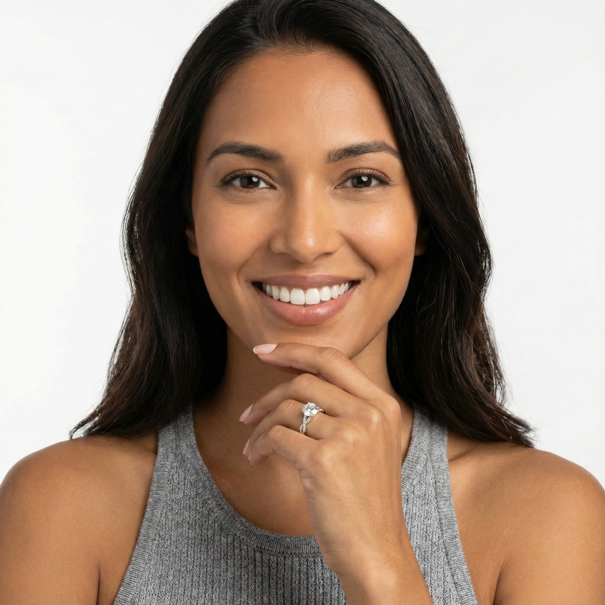 Round cut lab grown diamond twisted side stone engagement ring in platinum