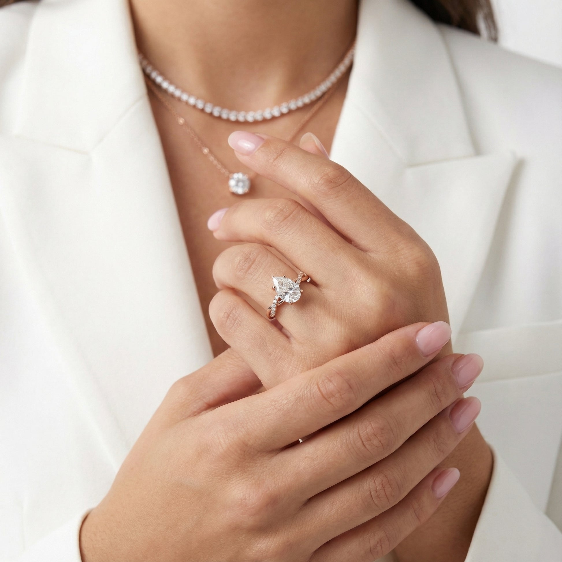 Pear Cut Lab Grown Diamond Twisted Engagement Ring in Rose Gold