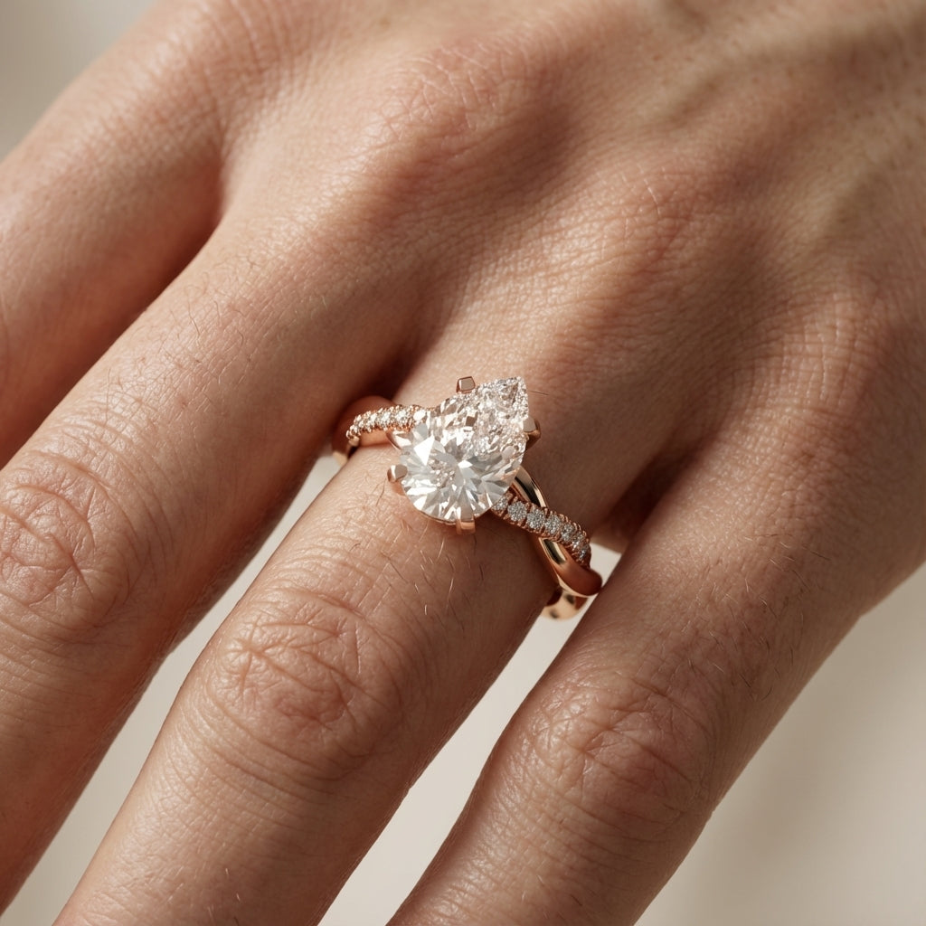 Pear Cut Lab Grown Diamond Twisted Engagement Ring in Rose Gold