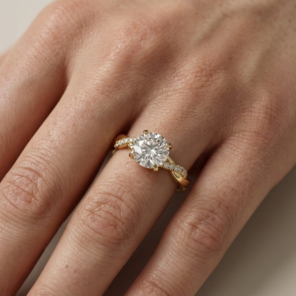 Round cut lab grown diamond twisted side stone engagement ring in yellow gold