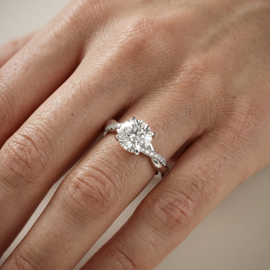 Round cut lab grown diamond twisted side stone engagement ring in platinum