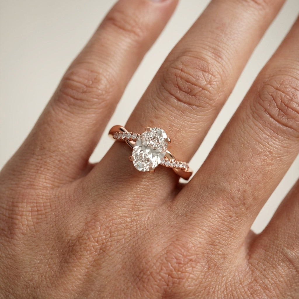 Oval Cut Lab Grown Diamond Twisted Side Stone Engagement Ring in Rose Gold