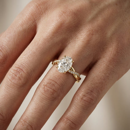 Oval Cut Lab Grown Diamond Twisted Side Stone Engagement Ring in Yellow Gold