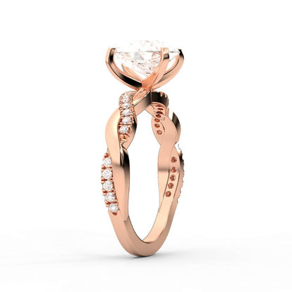Pear Cut Lab Grown Diamond Twisted Engagement Ring in Rose Gold