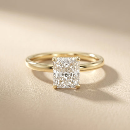 Charlotte Charm Radiant Cut Lab Grown Diamond Solitaire Engagement Ring in Yellow Gold showing dome shank.