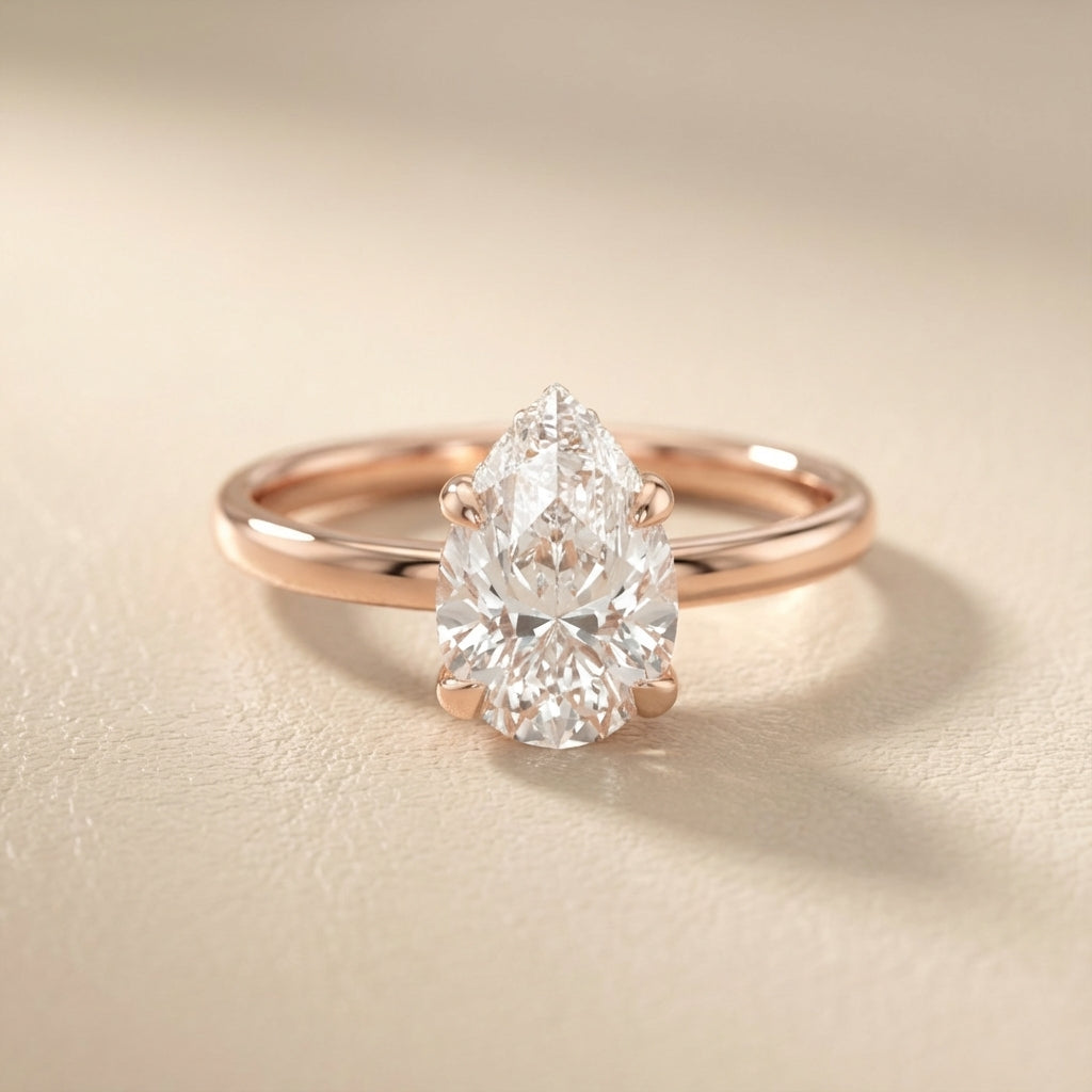 Pear Cut Lab Grown Diamond Solitaire Engagement Ring in Rose Gold showing side profile