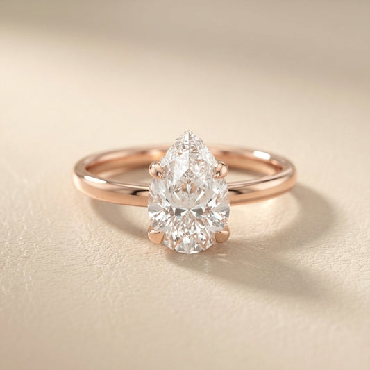 Pear Cut Lab Grown Diamond Solitaire Engagement Ring in Rose Gold showing side profile