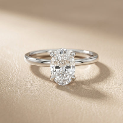 Oval Cut Lab Grown Diamond Solitaire Engagement Ring in Platinum showing hidden collar