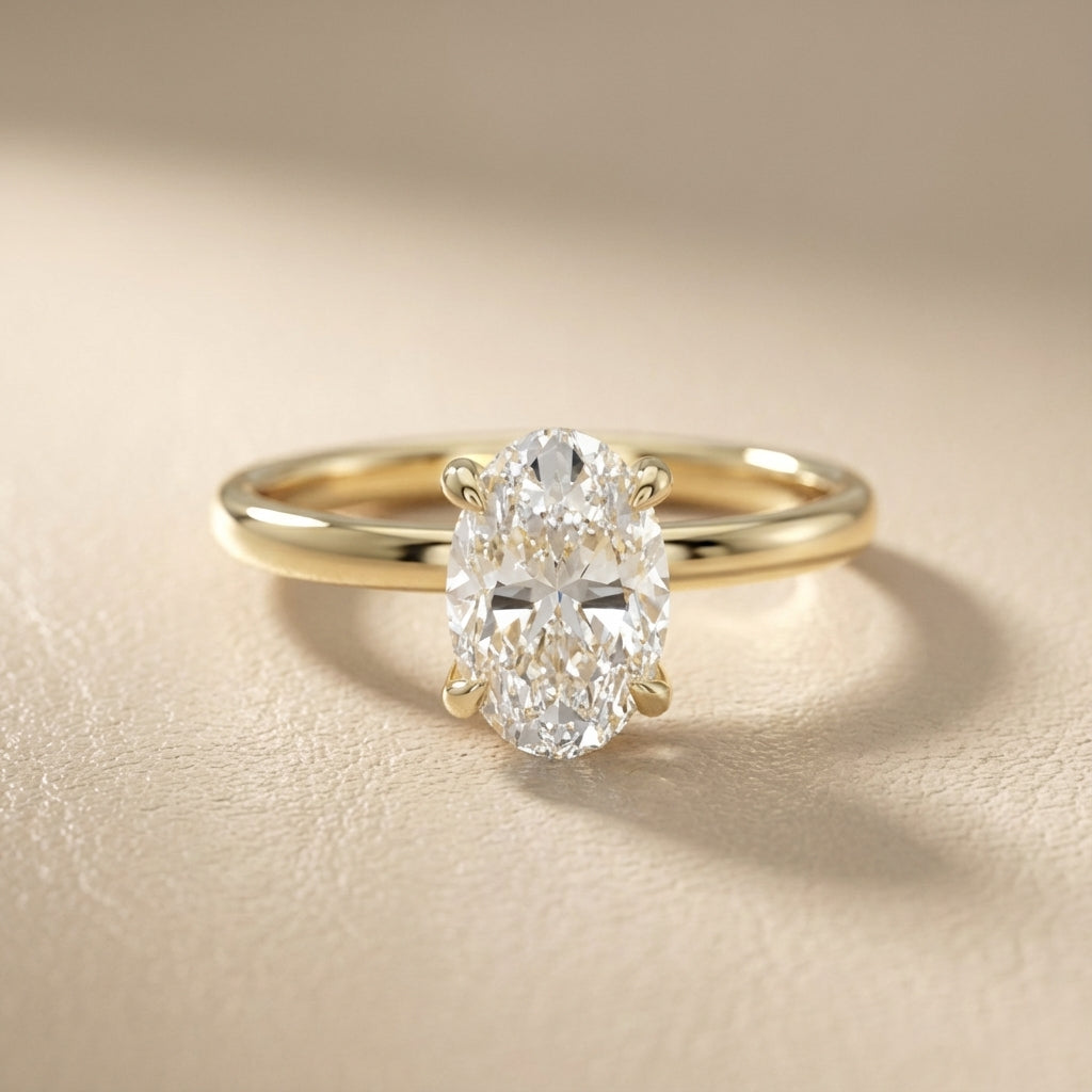 Oval Cut Lab Grown Diamond Solitaire Engagement Ring in Yellow Gold with four claws