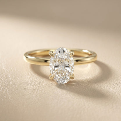 Oval Cut Lab Grown Diamond Solitaire Engagement Ring in Yellow Gold with four claws