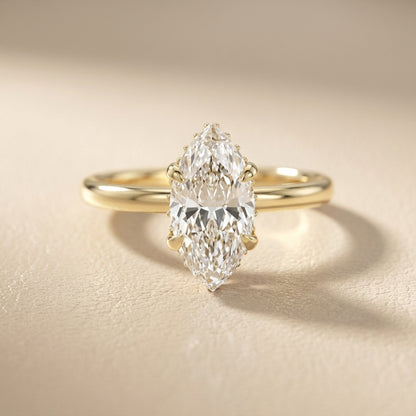 Charlotte Charm Marquise Cut Lab Grown Diamond Solitaire Engagement Ring in Yellow Gold with hidden halo detail