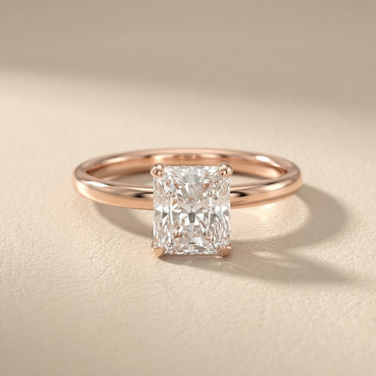 Charlotte Charm Radiant Cut Lab Grown Diamond Solitaire Engagement Ring in Rose Gold showing side profile and hidden halo.