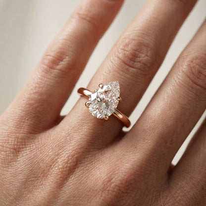 Pear Cut Lab Grown Diamond Solitaire Engagement Ring in Rose Gold showing side profile