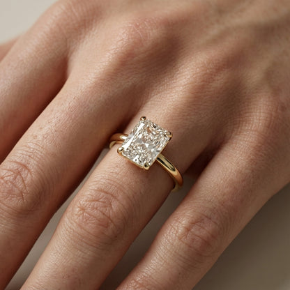 Charlotte Charm Radiant Cut Lab Grown Diamond Solitaire Engagement Ring in Yellow Gold showing dome shank.