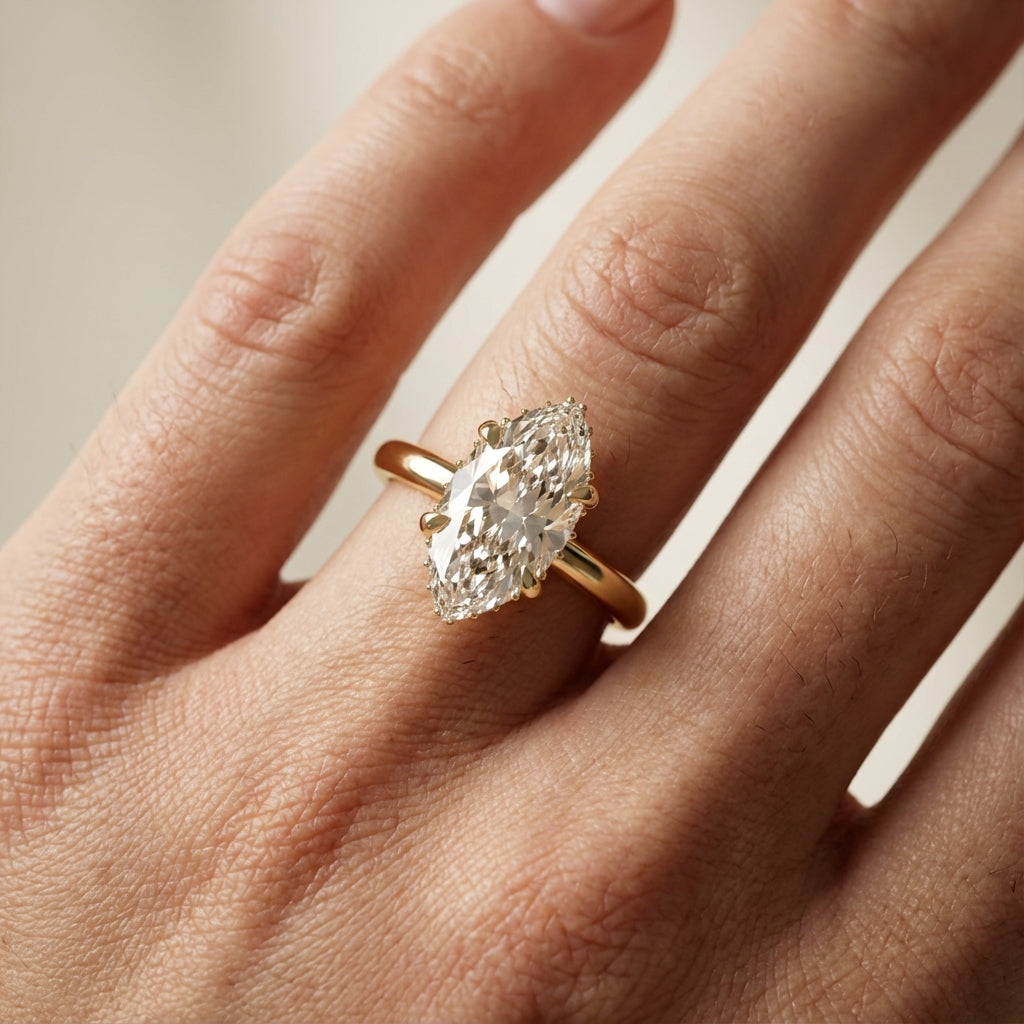 Charlotte Charm Marquise Cut Lab Grown Diamond Solitaire Engagement Ring in Yellow Gold with hidden halo detail