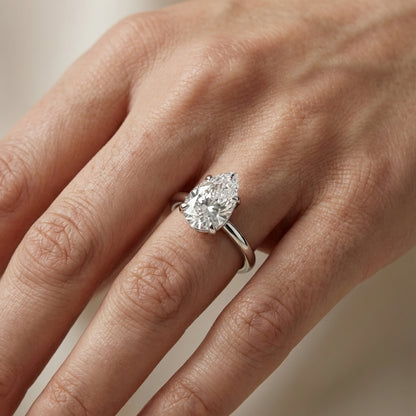 Pear Cut Lab Grown Diamond Solitaire Engagement Ring in Silver with hidden accents