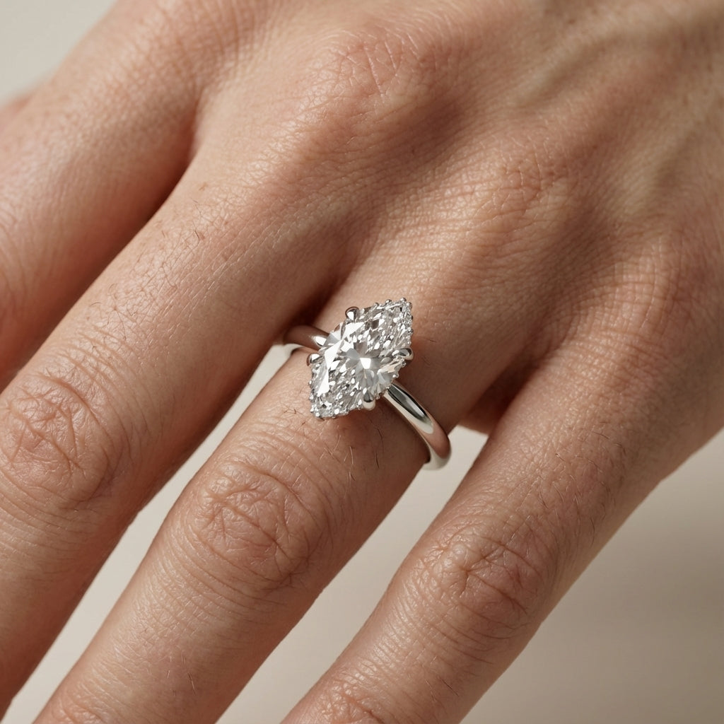 Charlotte Charm Marquise Cut Lab Grown Diamond Solitaire Engagement Ring in Silver with hidden halo side view