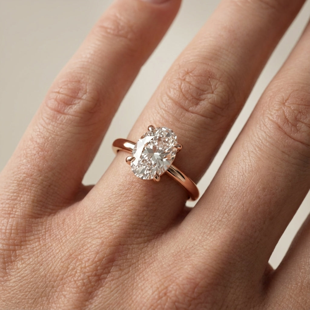 Oval Cut Lab Grown Diamond Solitaire Engagement Ring in Rose Gold showing hidden halo detail