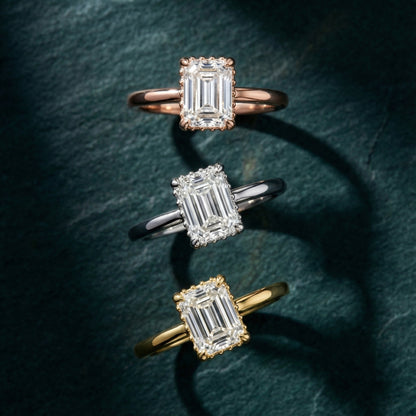 Emerald Cut Lab Grown Diamond Solitaire Engagement Ring in Rose Gold showing side profile with hidden accents