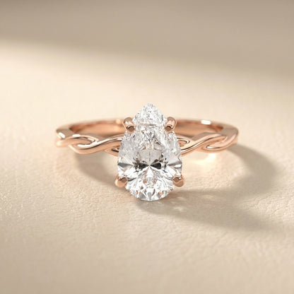 Pear Cut Lab Grown Diamond Solitaire Engagement Ring with Twisted Shank in Rose Gold