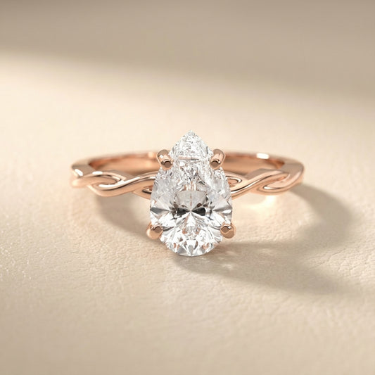 Pear Cut Lab Grown Diamond Solitaire Engagement Ring with Twisted Shank in Rose Gold