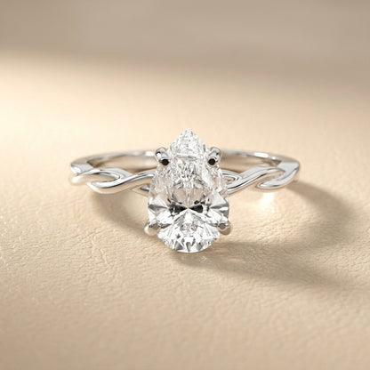Pear Cut Lab Grown Diamond Solitaire Engagement Ring with Twisted Shank in Silver