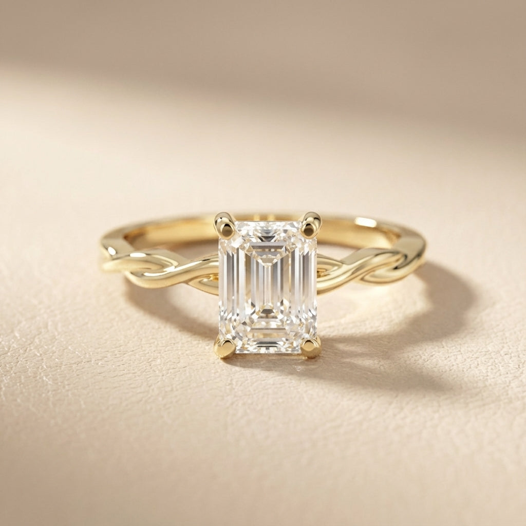 Emerald Cut Lab Grown Diamond Engagement Ring with Twisted Shank in Yellow Gold