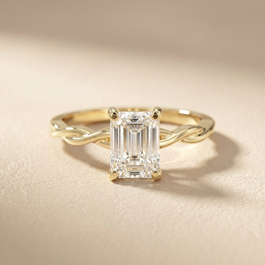 Emerald Cut Lab Grown Diamond Engagement Ring with Twisted Shank in Yellow Gold