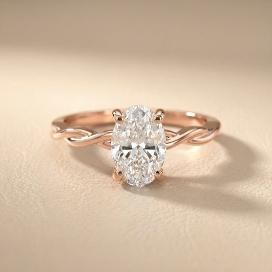 Oval Cut Lab Grown Diamond Engagement Ring in Rose Gold with twisted shank