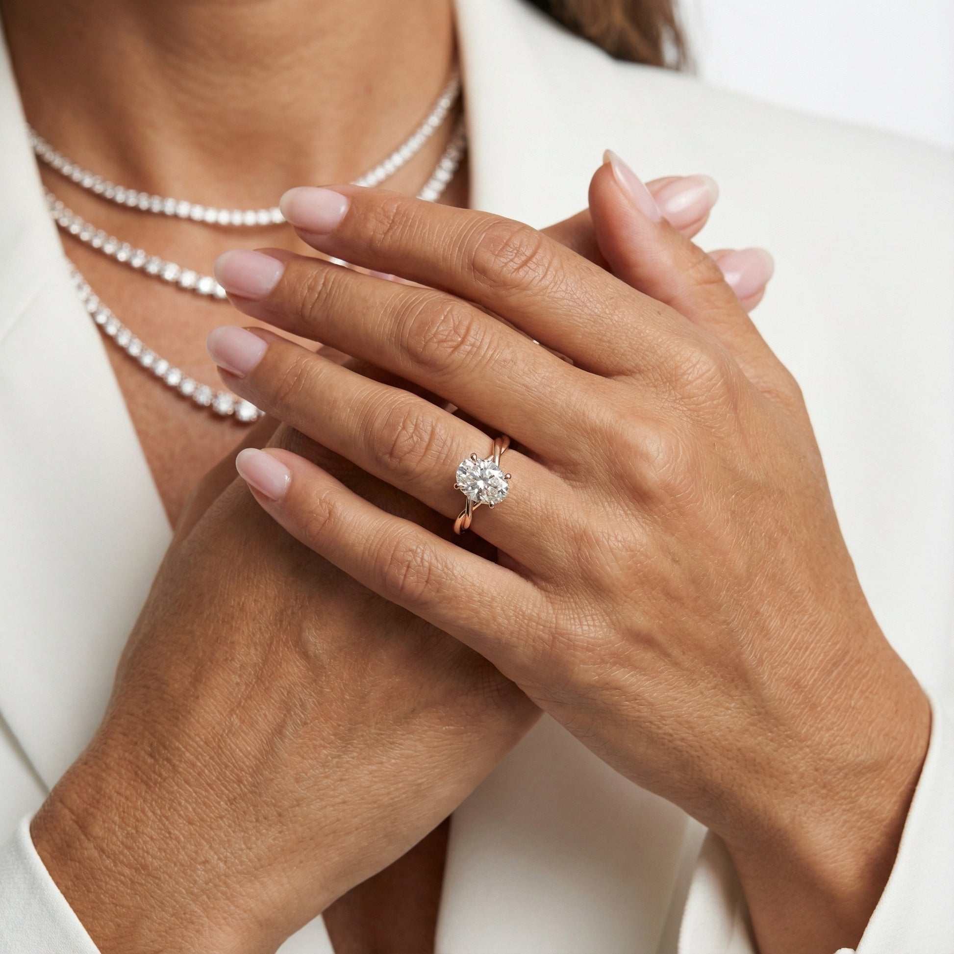 Cushion Cut Lab Grown Diamond Engagement Ring in Rose Gold with Intertwined Band