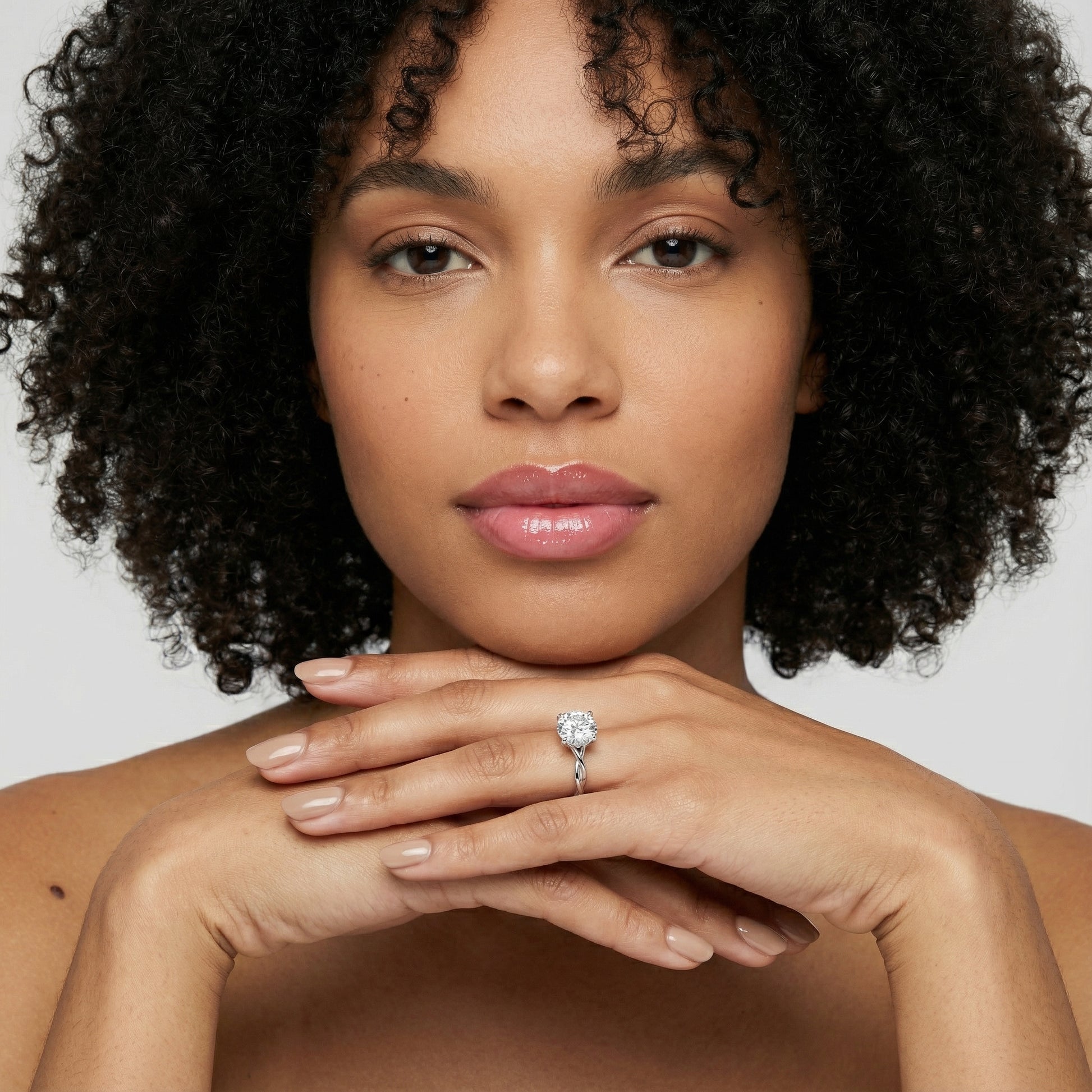 Round Cut Lab Grown Diamond Solitaire Engagement Ring with Twisted Shank in White Gold