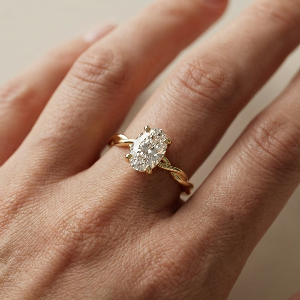 Oval Cut Lab Grown Diamond Engagement Ring in Yellow Gold with twisted shank