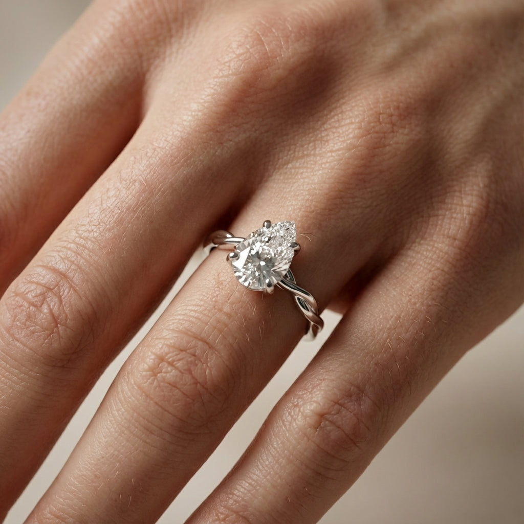 Pear Cut Lab Grown Diamond Solitaire Engagement Ring with Twisted Shank in Silver