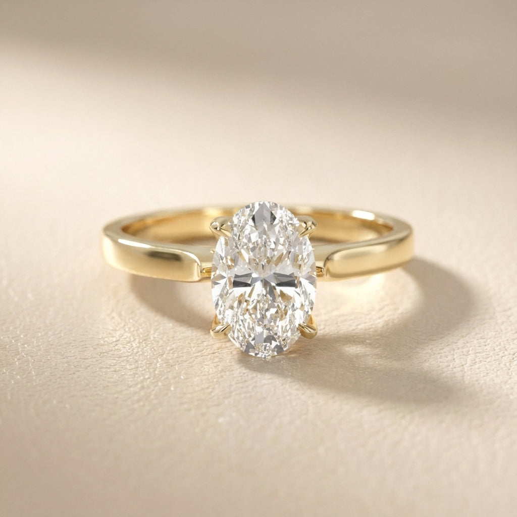 Oval Cut Lab Grown Diamond Solitaire Engagement Ring in Yellow Gold showing detailed petal prongs