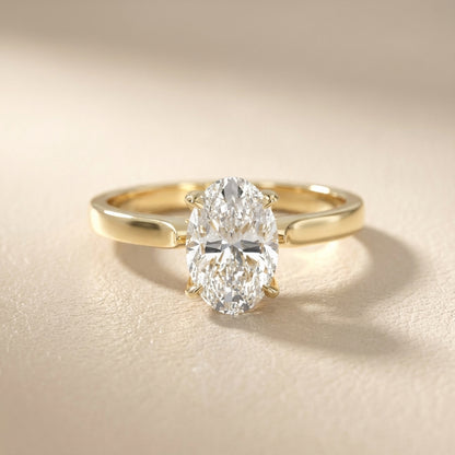 Oval Cut Lab Grown Diamond Solitaire Engagement Ring in Yellow Gold showing detailed petal prongs