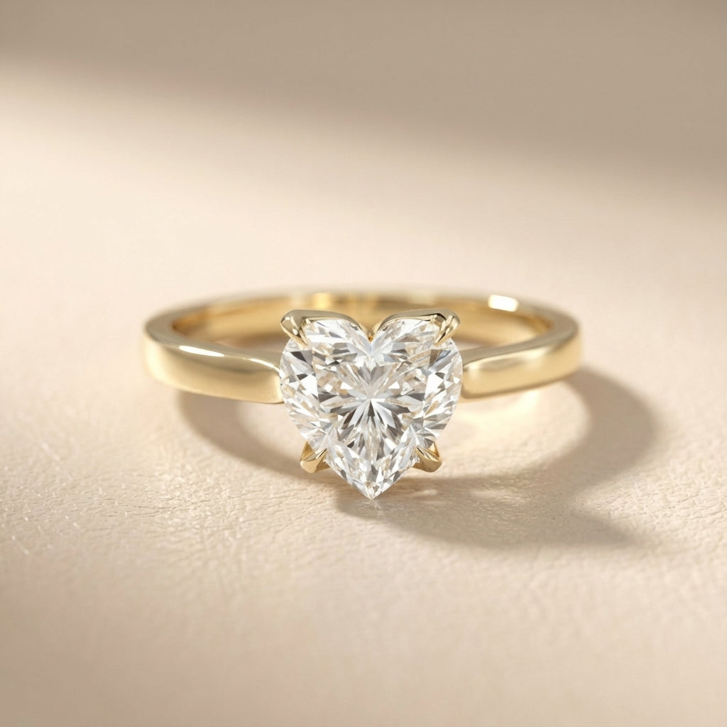 Heart Cut Lab Grown Diamond Solitaire Engagement Ring in traditional Yellow Gold setting.