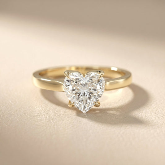 Heart Cut Lab Grown Diamond Solitaire Engagement Ring in traditional Yellow Gold setting.
