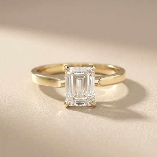 Emerald Cut Lab Grown Diamond Solitaire Engagement Ring in Yellow Gold with Floral Basket Setting