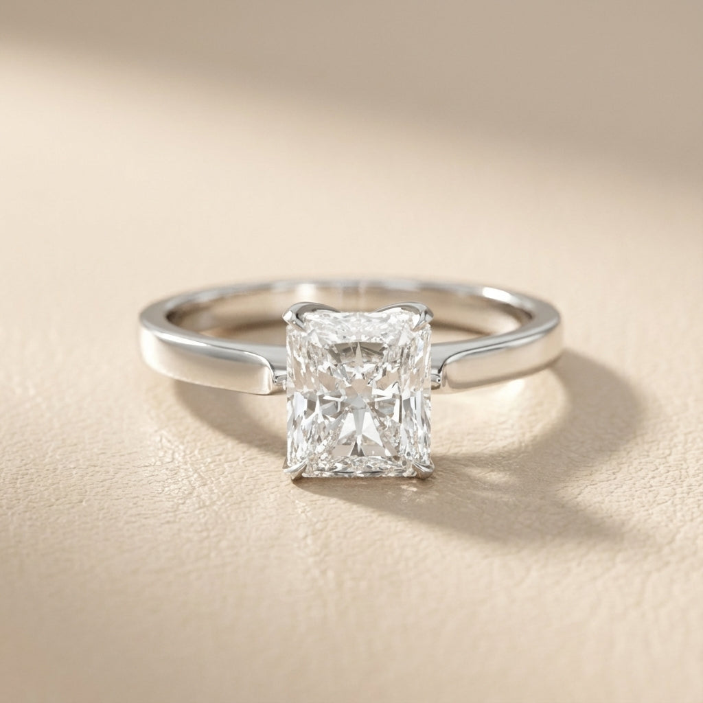 Radiant Cut Lab Grown Diamond Solitaire Engagement Ring in Platinum showing floral prongs