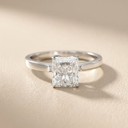 Radiant Cut Lab Grown Diamond Solitaire Engagement Ring in Platinum showing floral prongs
