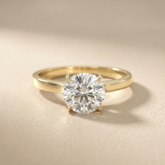 Round cut lab grown diamond solitaire engagement ring in yellow gold with floral basket setting