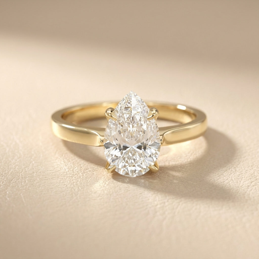 Pear Cut Lab Grown Diamond Solitaire Engagement Ring in Yellow Gold side profile view