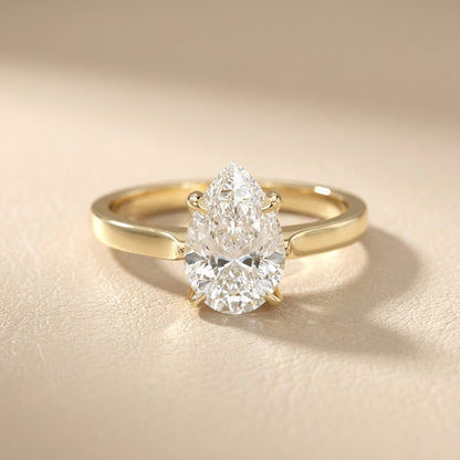 Pear Cut Lab Grown Diamond Solitaire Engagement Ring in Yellow Gold side profile view