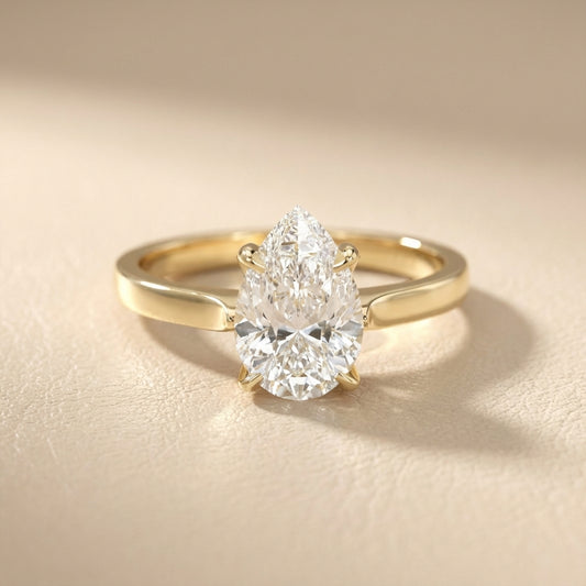 Pear Cut Lab Grown Diamond Solitaire Engagement Ring in Yellow Gold side profile view