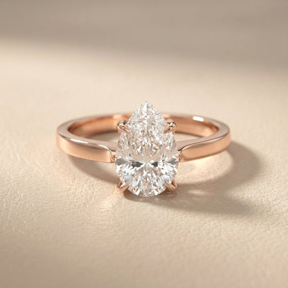 Pear Cut Lab Grown Diamond Solitaire Engagement Ring in Rose Gold showing floral prong details