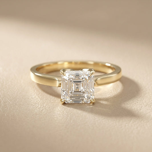 Asscher Cut Lab Grown Diamond Solitaire Engagement Ring in Yellow Gold with cathedral setting.