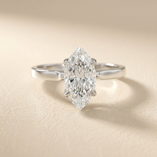 Marquise cut lab grown diamond solitaire engagement ring in durable platinum setting.