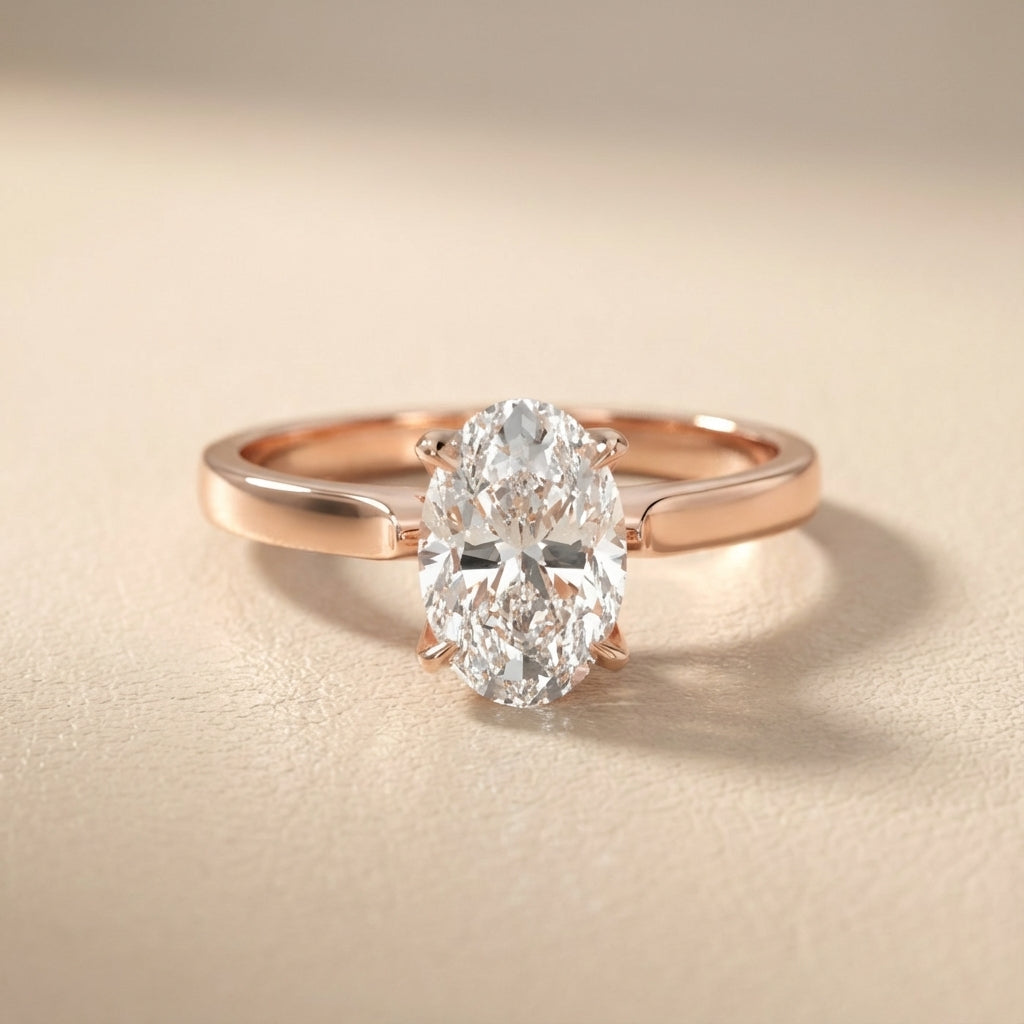 Oval Cut Lab Grown Diamond Solitaire Engagement Ring in Rose Gold showing side profile and setting