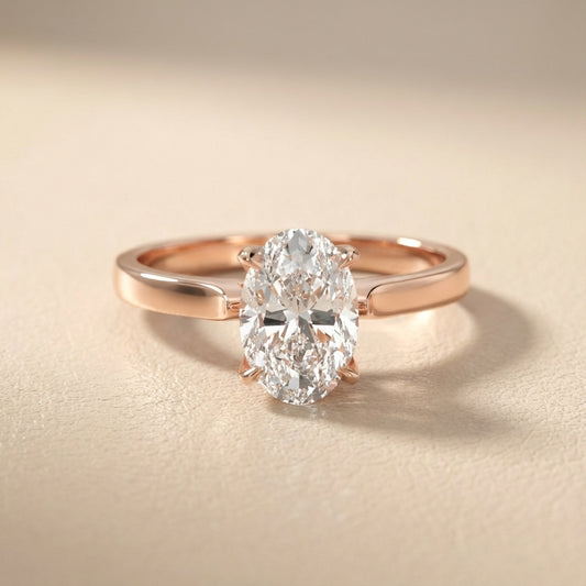 Oval Cut Lab Grown Diamond Solitaire Engagement Ring in Rose Gold showing side profile and setting