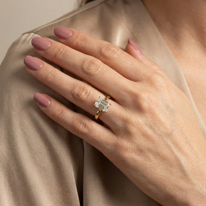 Emerald Cut Lab Grown Diamond Solitaire Engagement Ring in Yellow Gold with Floral Basket Setting